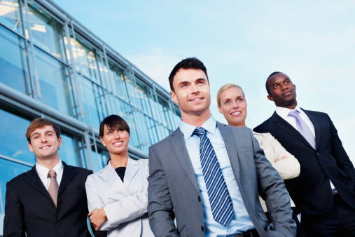 Office people standing in front of the office